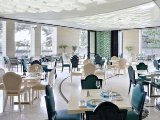 Giardino open-area dining hall at Palazzo Versace Dubai