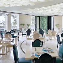 Dining table setup in Giardino Restaurant at Palazzo Versace