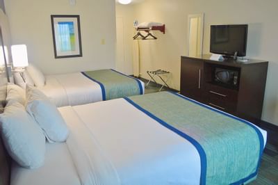 Double Queen Beds and dresser with TV