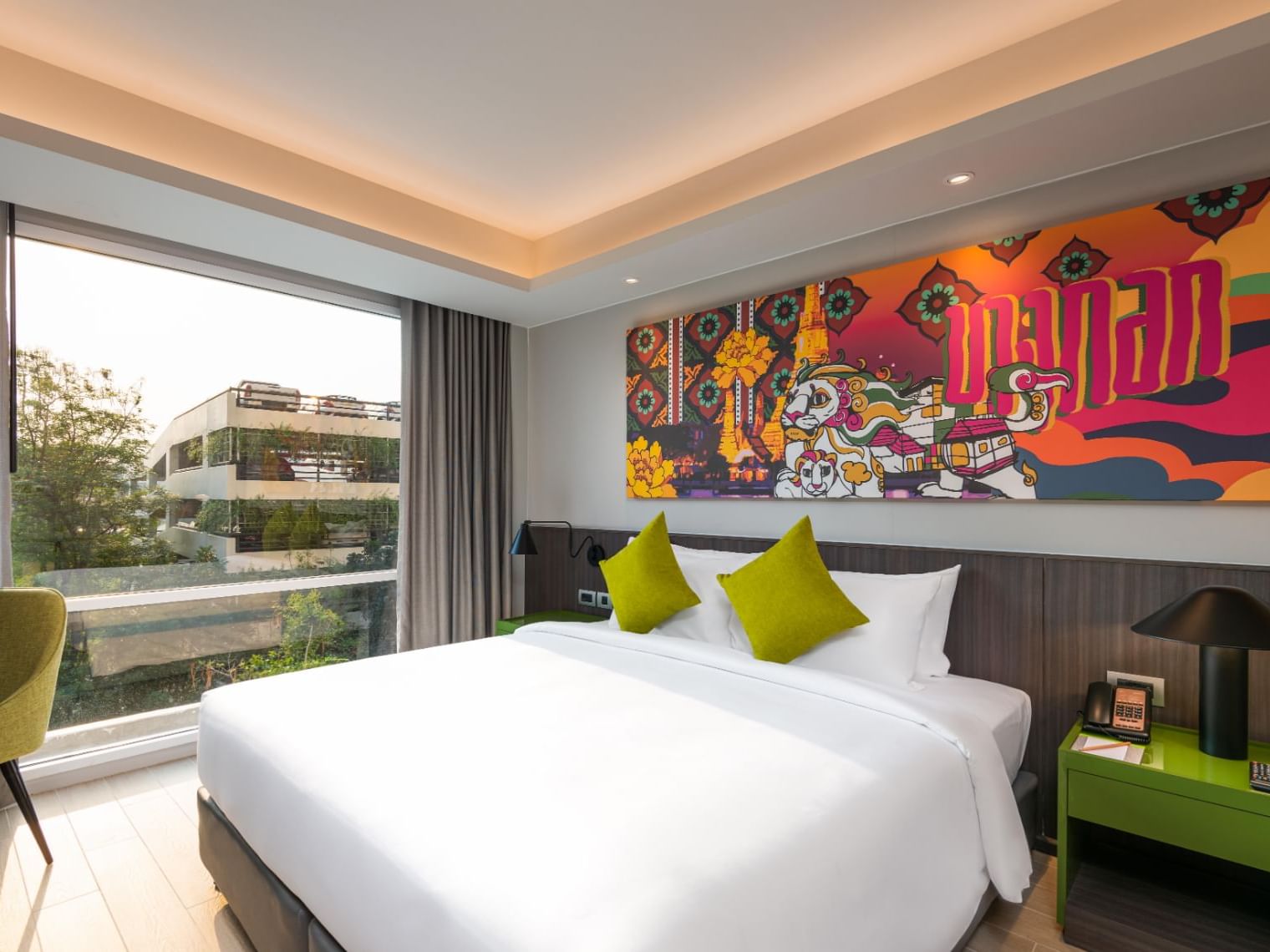 King bed in Superior Family Triple Room at Maitria Hotel Rama 9
