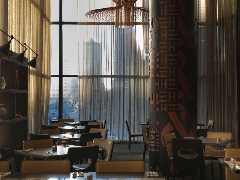 Tables arranged in Mr. Hive Kitchen & Bar at Crown Hotels