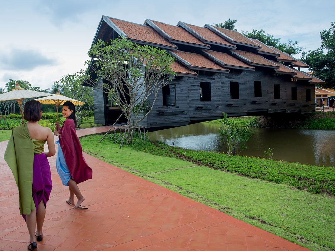 Ladies walking on a pathway, Mallika City, 1905 A.D. , U Hotels