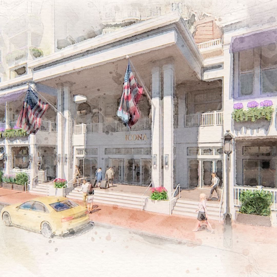 Proposed ICONA Cape May Rendering front entrance flanked by white columns, American flags, porches, and many flower boxes 
