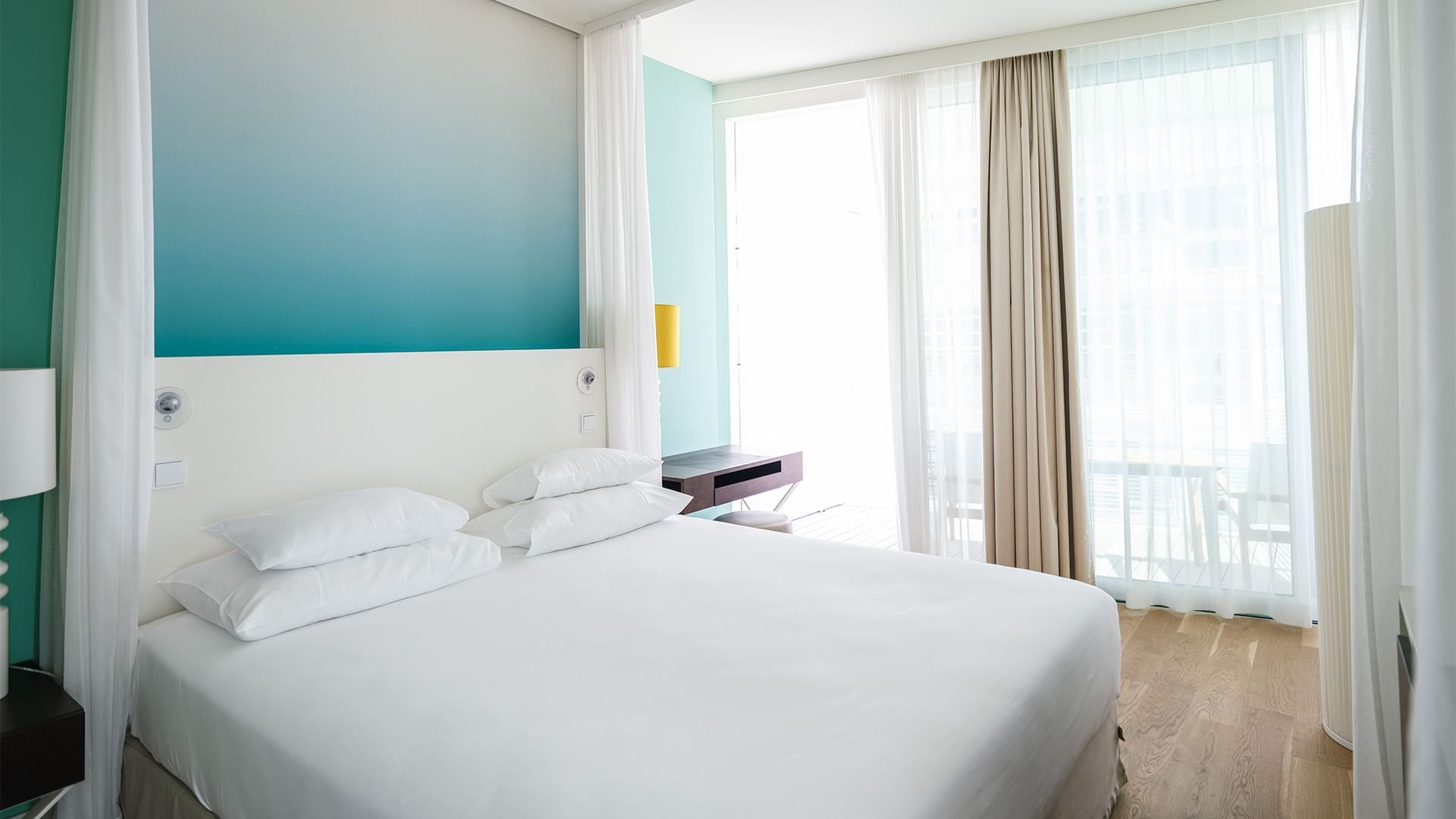 Large bed in Giudecca Suite sea view at Falkensteiner Hotels