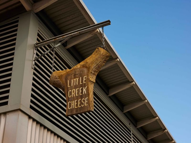 Little Creek Cheese Central Coast NSW sign board near Pullman Magenta Shores