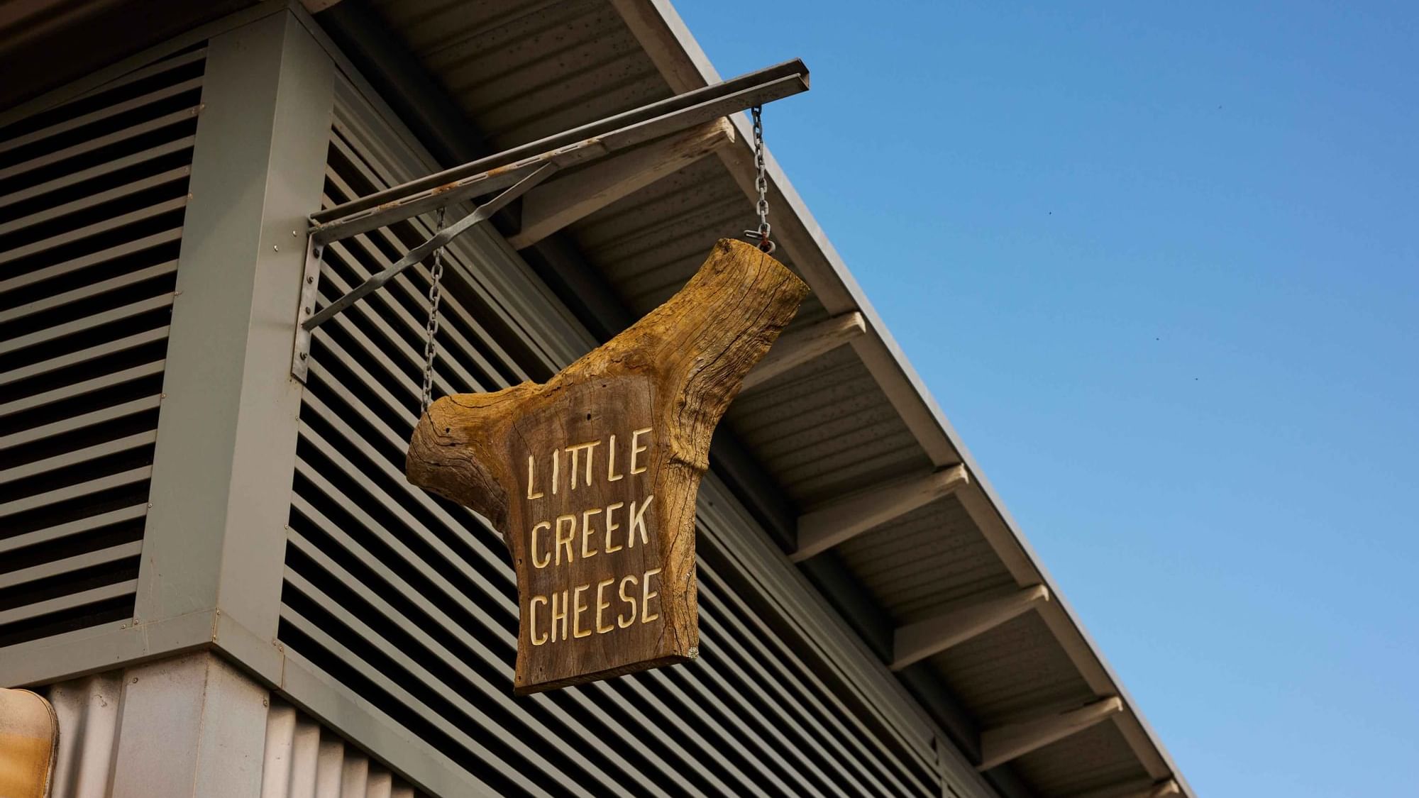 Little Creek Cheese Central Coast NSW sign board near Pullman Magenta Shores