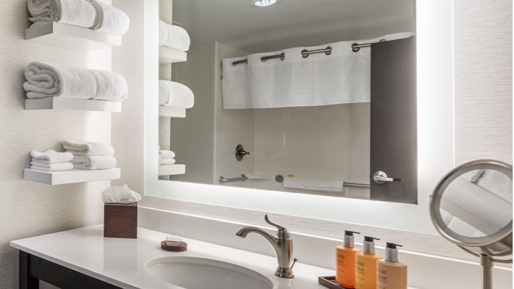Modern bathroom featuring a backlit mirror in Double Queen Studio Balcony at Shangri-La Monkey Island