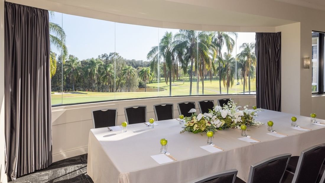 Panoramic view of The Lounge event room with golf course backdrop at Mercure Gold Coast Resort in Carrara.