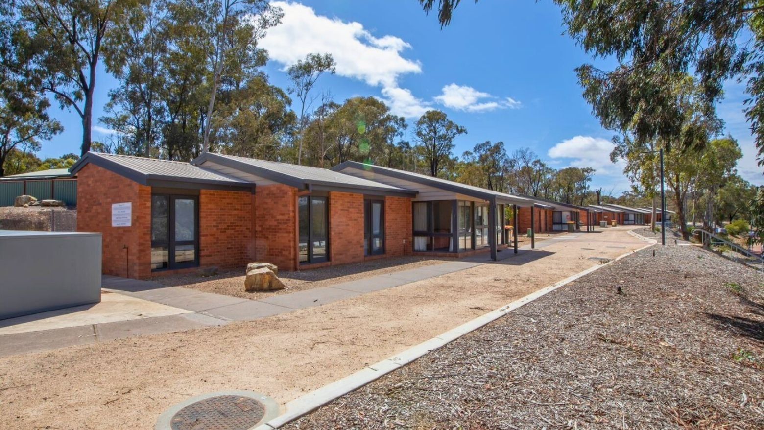 Row of modern brick Terraces with glass windows and doors at La Trobe University.