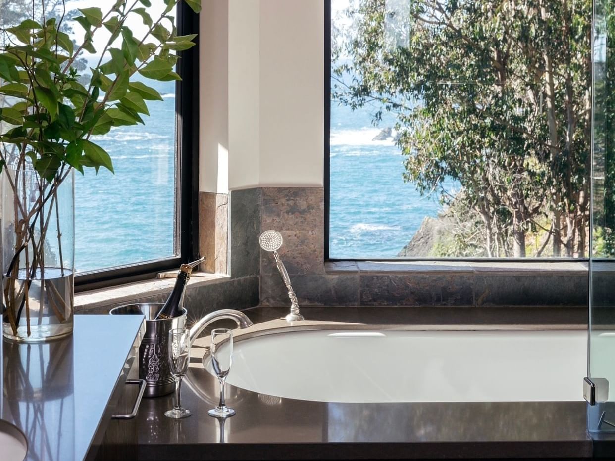 Tub in Ocean View with Tub bathroom at Heritage House Resort
