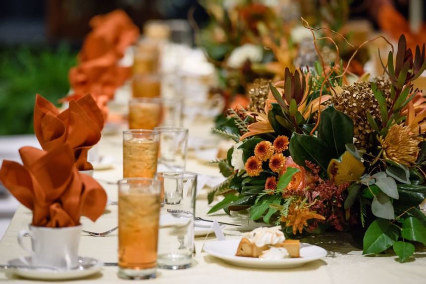 table with fall decorations and tea