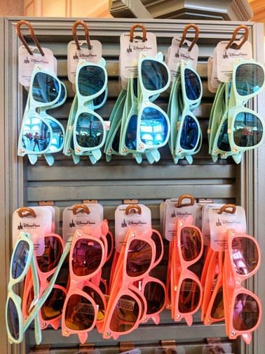 Sunglasses displayed on a rack at Shop Smart near Lake Buena Vista Resort Village & Spa