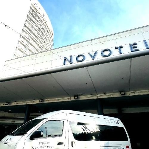 Low-angle view of hotel entrance at Novotel Sydney Olympic Park