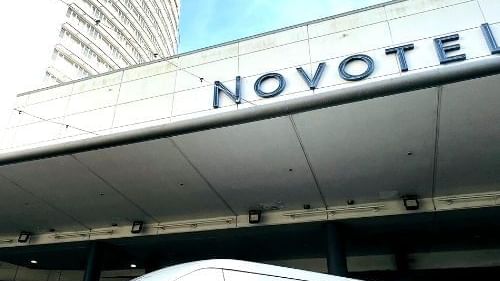 Low-angle view of hotel entrance at Novotel Sydney Olympic Park