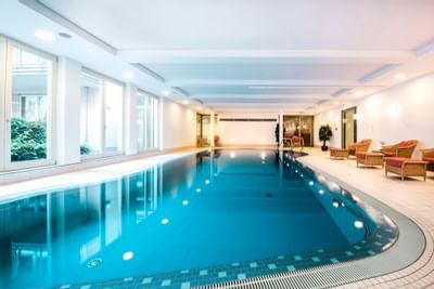 Indoor Swimming Pool and Loungers in Hotel Collegium Leoninum, Bonn