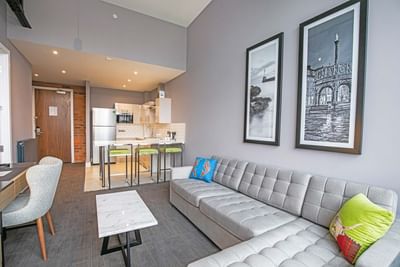 The living area and the pantry area in a room at the Sandman Sig