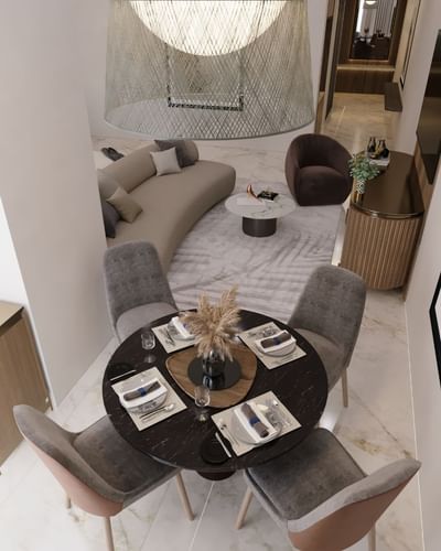 Dining table in a living room at Joudyan Red Sea Mall