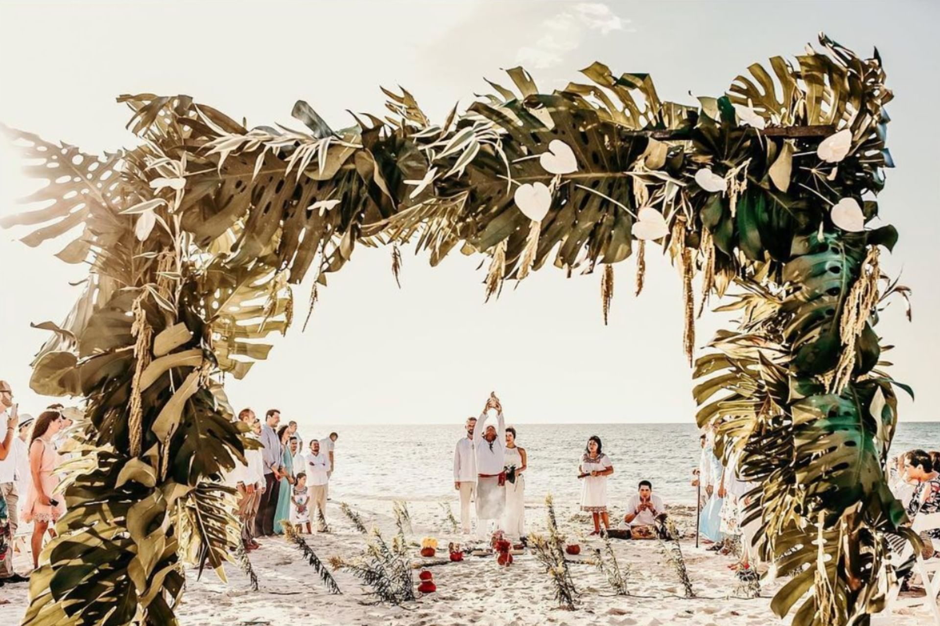 Outdoor wedding ceremony with a beach view at Mundo Imperial