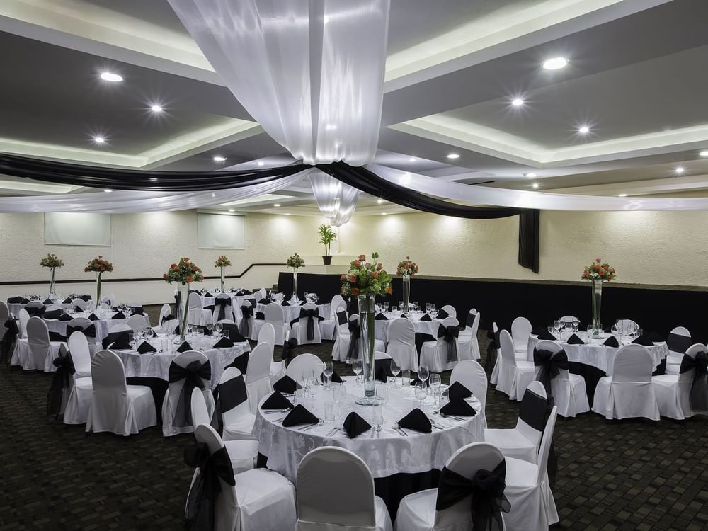 Salon C Hall with banquet tables arranged at Gamma Pachuca