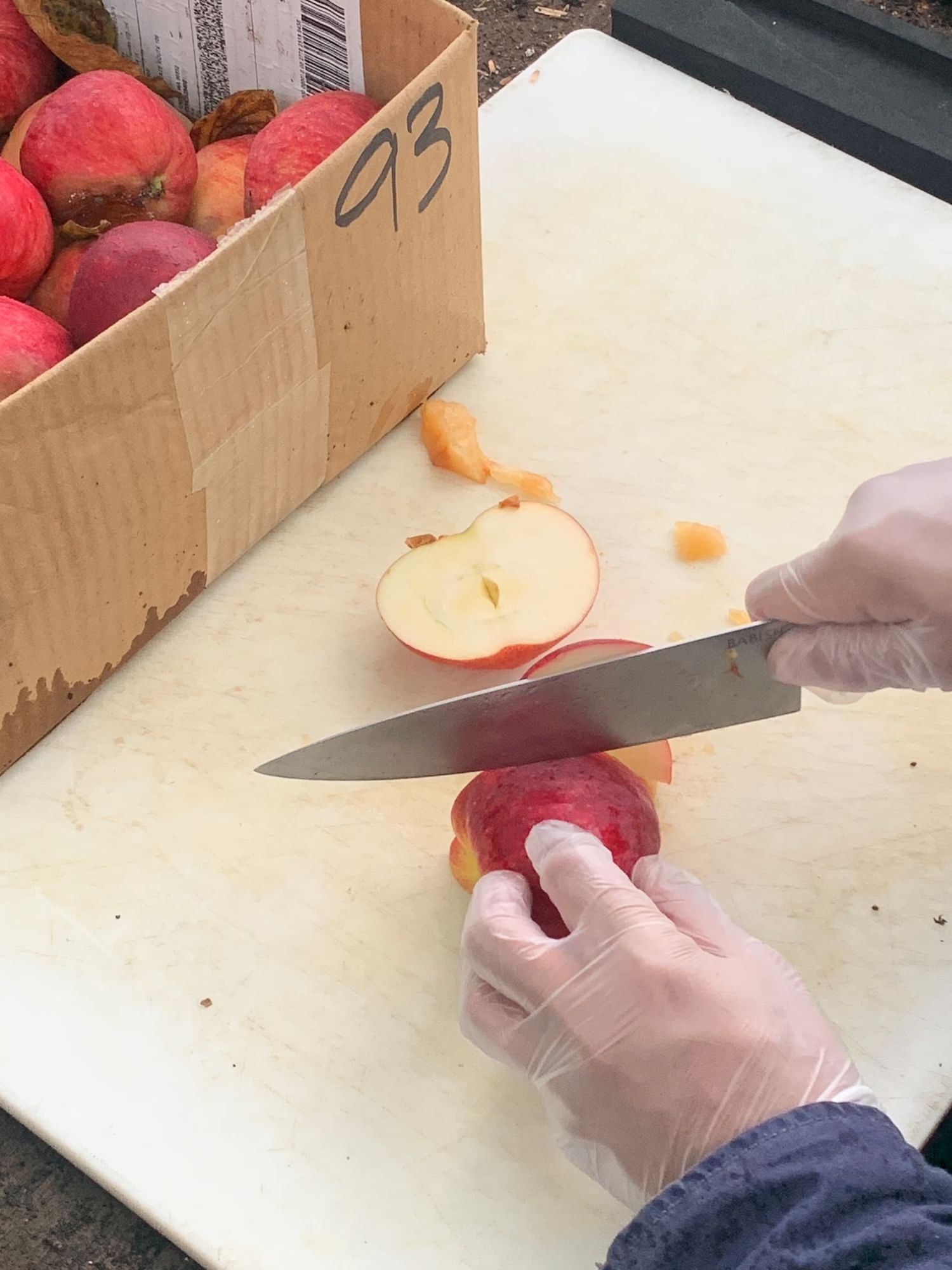 slicing apples for composting