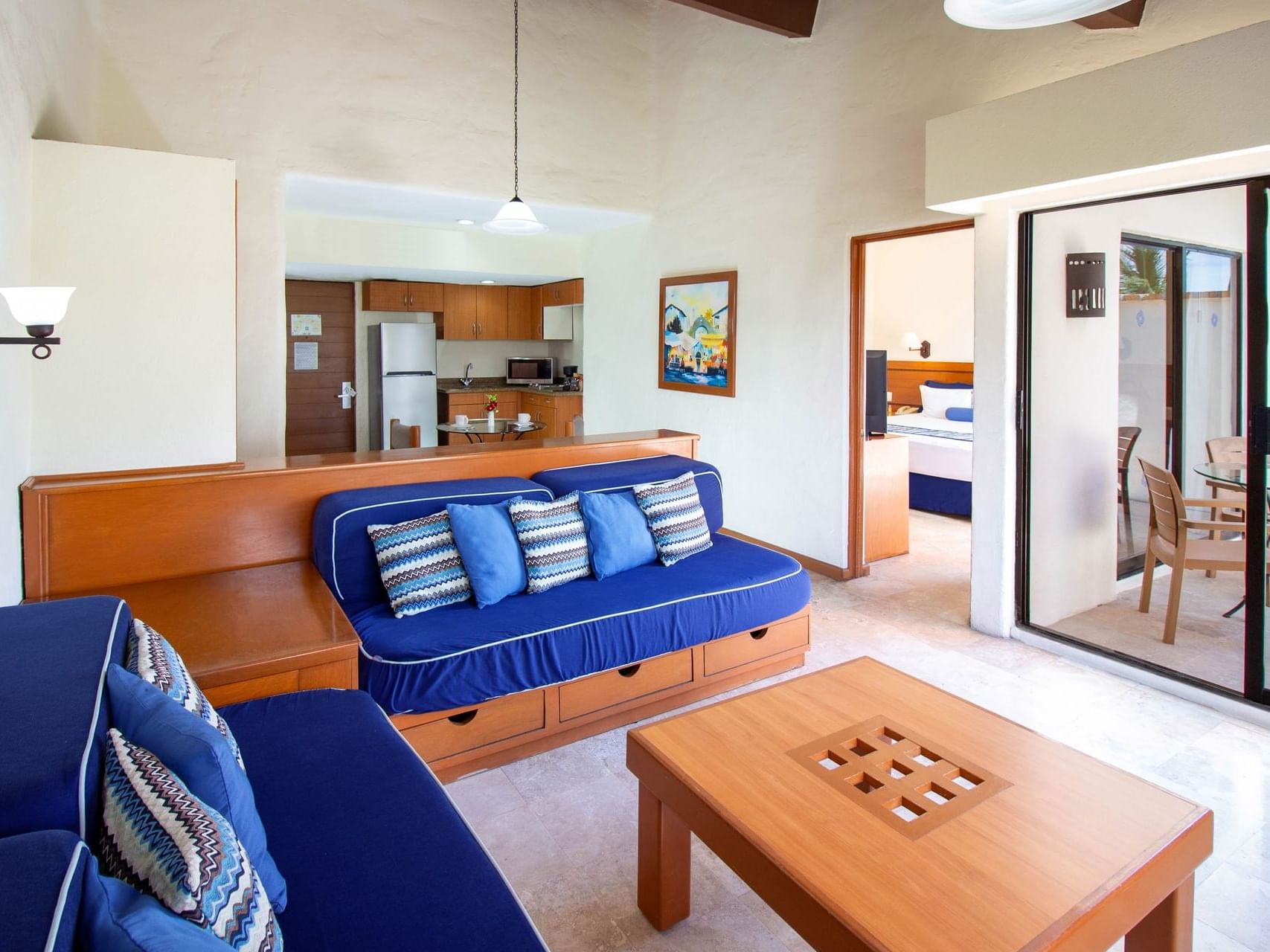 Living area with kitchenette in 1 Bedroom King Suite with Terrace at Plaza Pelicanos Grand Beach Resort