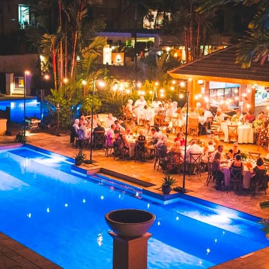 Night time poolside event at Pullman Palm Cove Sea Resort