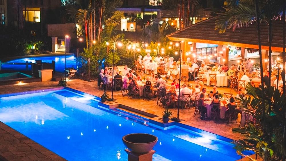 Night time poolside event at Pullman Palm Cove Sea Resort