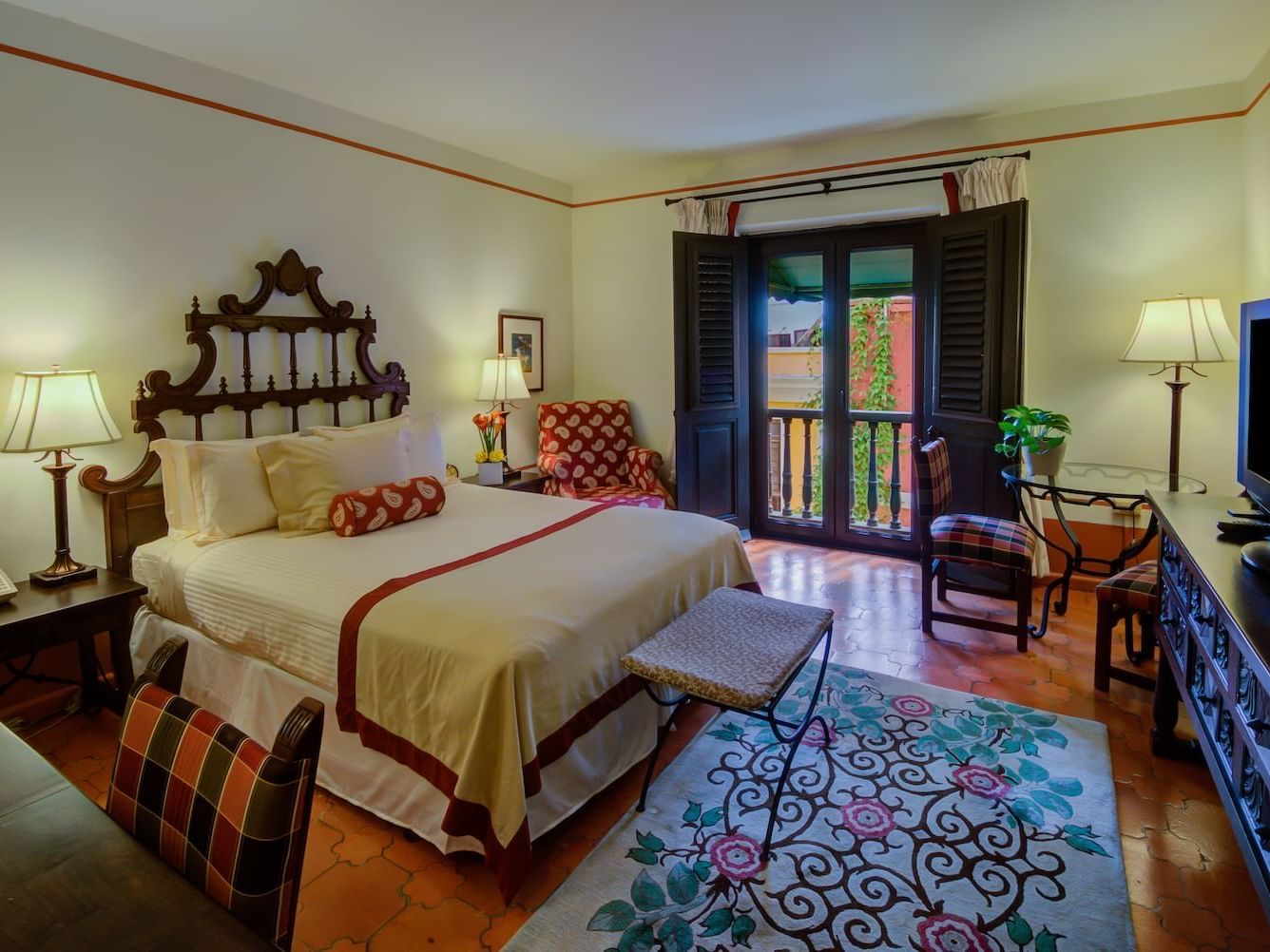 Interior view of Queen vista with king bed at Hotel El Convento