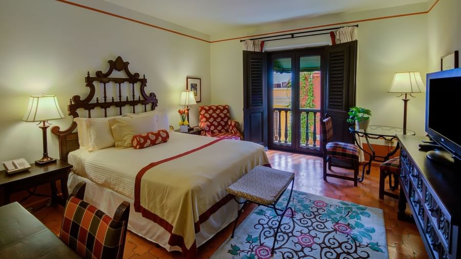 Interior view of Queen vista with king bed at Hotel El Convento