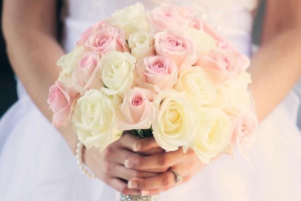 Bride holding bouquet at her wedding