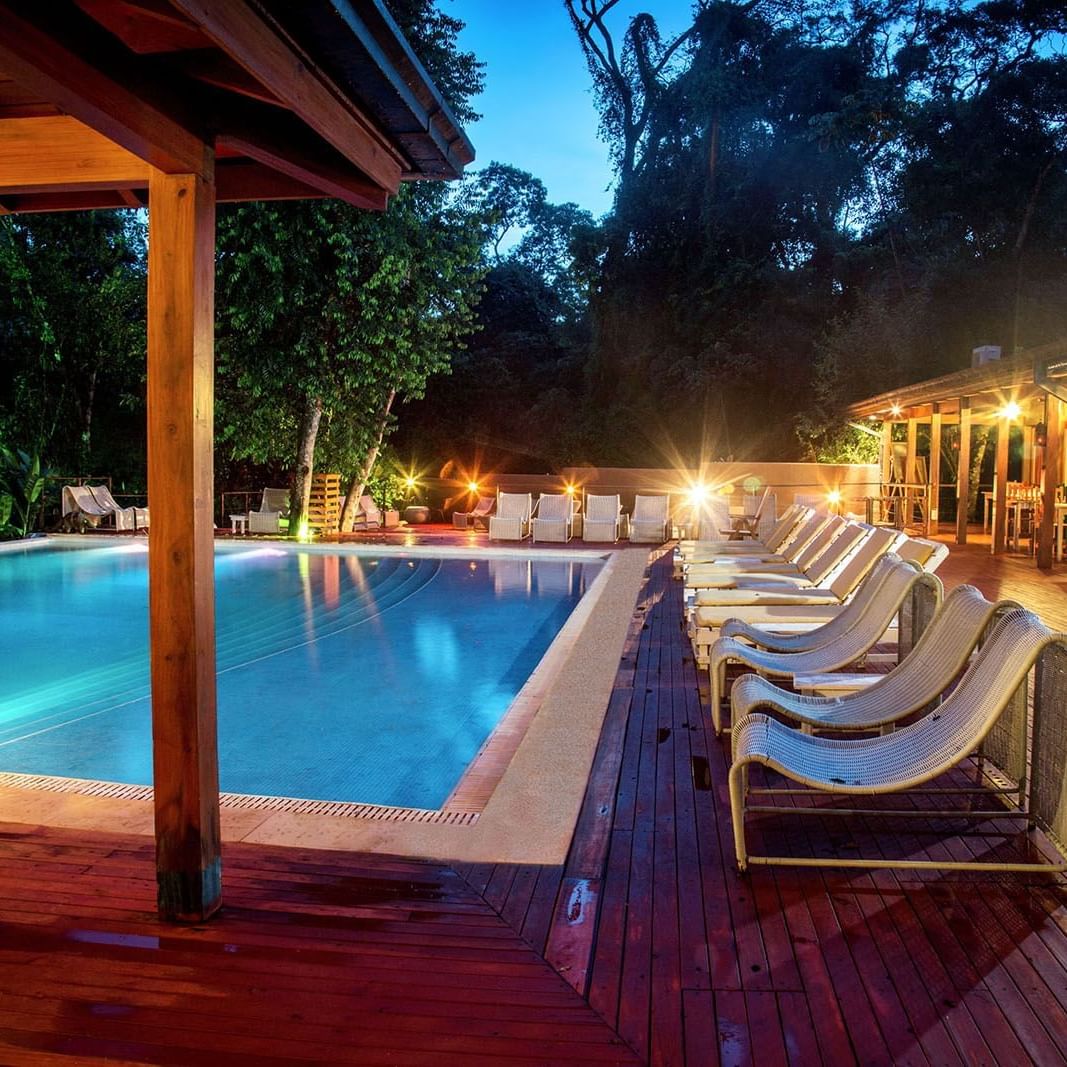 Outdoor pool & lounges at La Cantera Lodge De Selva by Don