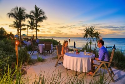 Evening outdoor dine in at Dune dining at Windsong Resort On The Reef
