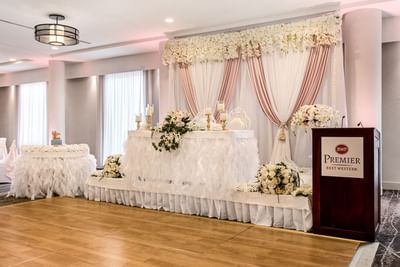 Floral head table décor & dance floor at Best Western Premier