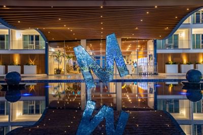 Fountain & décor by hotel entrance at Morgan Resort Spa Village