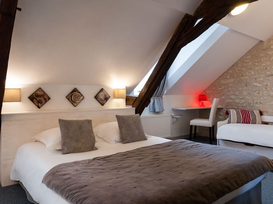 Interior of the Standard room at Le Pigeonnier du Perron