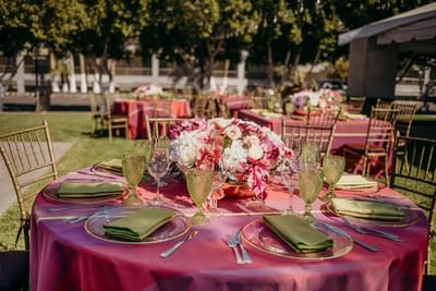 Pink floral banquet table in the Garden at Araiza Hotel Calafia