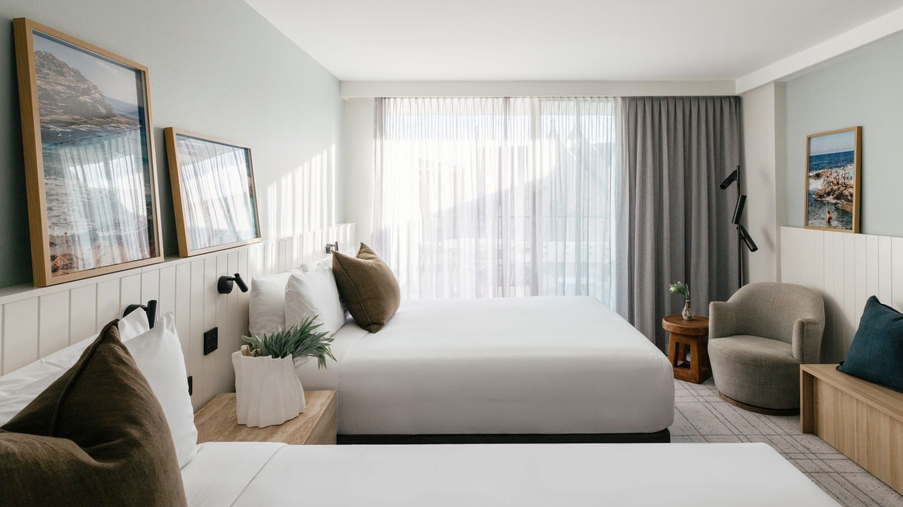 Village Terrace Twin at Elysium Manly with white linen beds by wooden side tables, best places to stay in Manly
