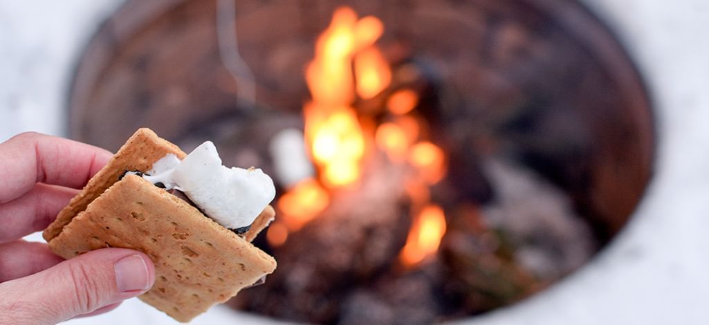 smores by a campfire in the winter