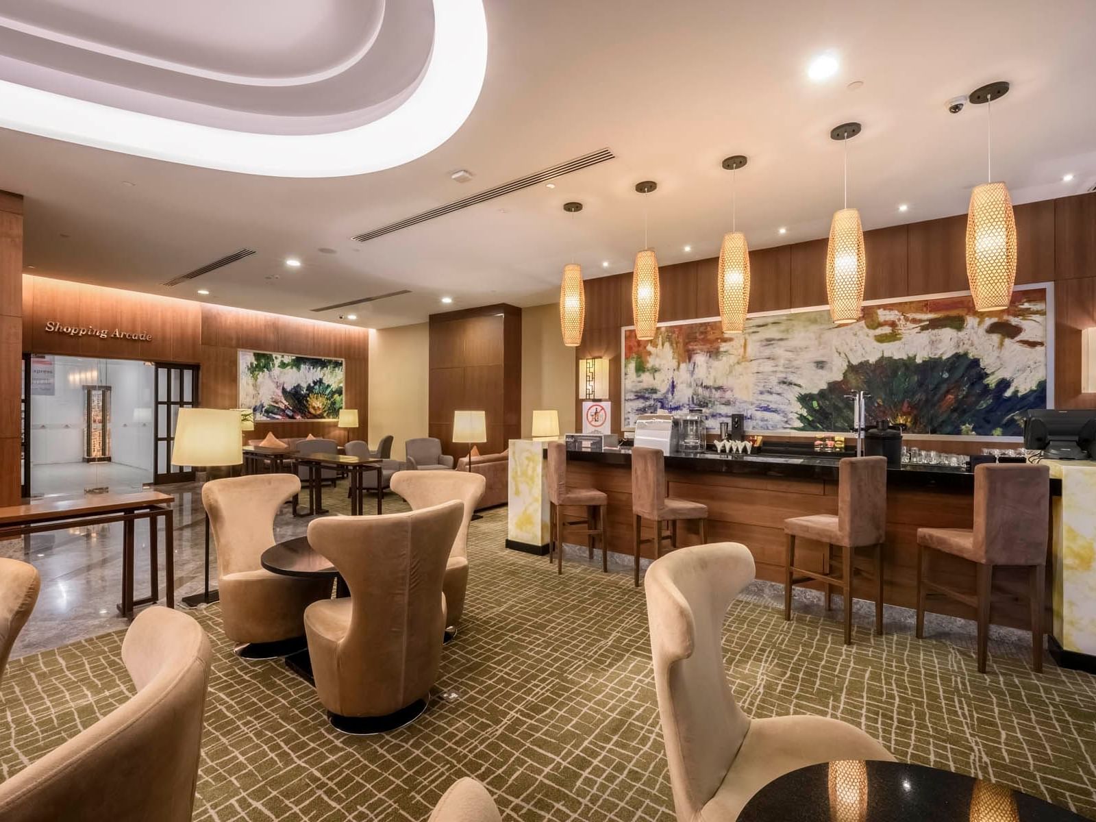 The lobby with lounges & bar area at St. Giles Wembley Hotel