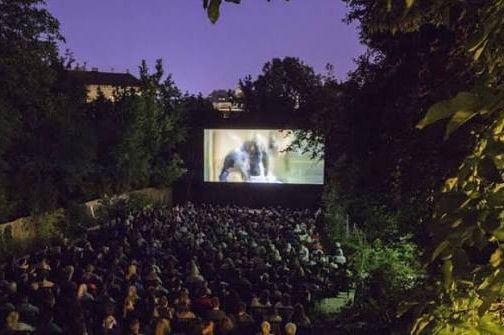 Atmospheric open air cinema in Augarten featuring classic films and contemporary productions set within one of Vienna’s historic parks under the open sk