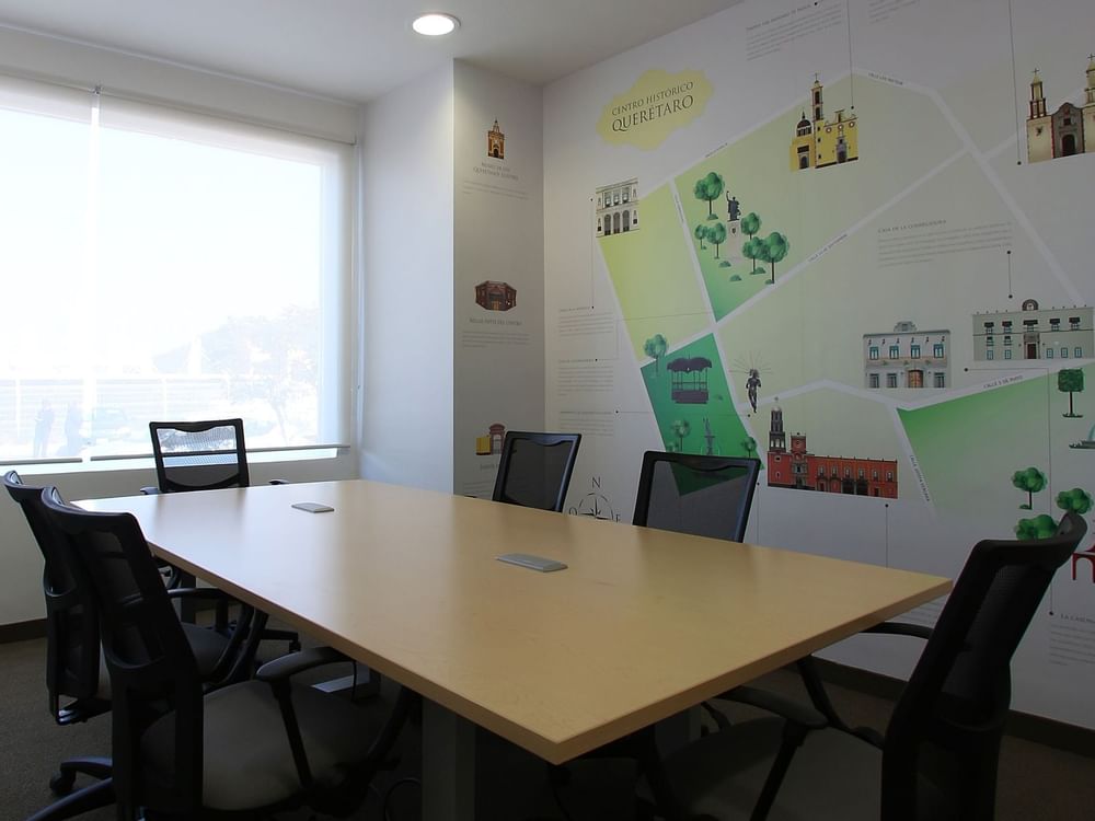 Conference table with chairs in a Meeting Room at One Hotels