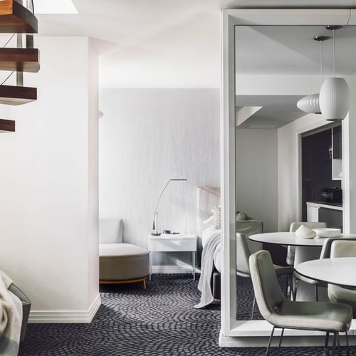 Lounge area & stairway in Pearl Penthouse at Como Melbourne