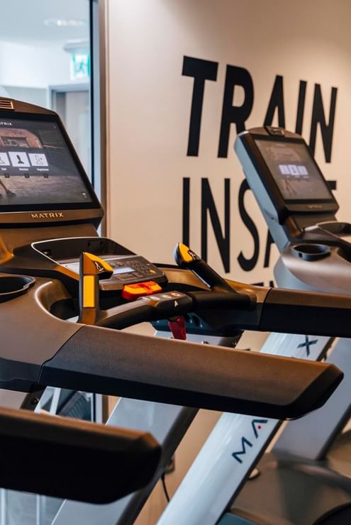 Treadmills in a fitness center at Hotel Berlin Berlin