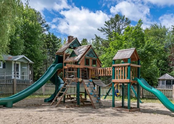 Kids outdoor playground area with activities at Sebasco Harbor Resort