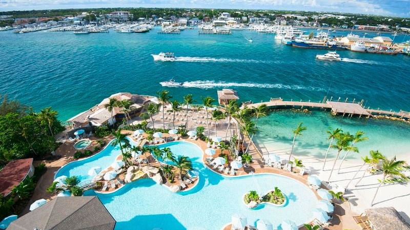 Aerial view of the hotel pool & beach at Warwick Paradise Island Bahamas