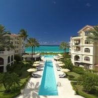 Outdoor pool with sea view at The Somerset on Grace Bay