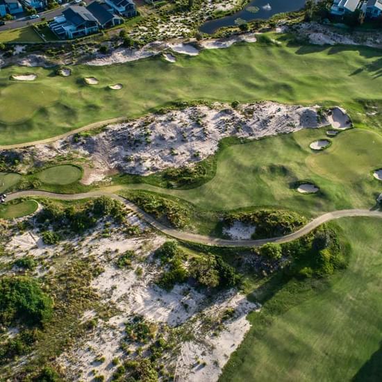 Aerial view of golf course near Pullman Magenta Shores Resort