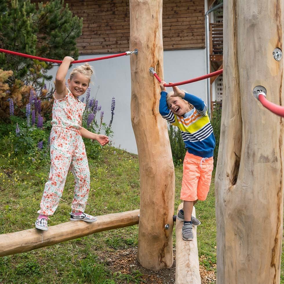 Kids playing at the playground near Falkensteiner Hotels