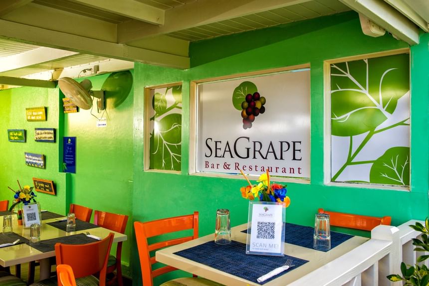 Indoor dining area in Sea Grape Bar & Restaurant at Dover Beach Hotel