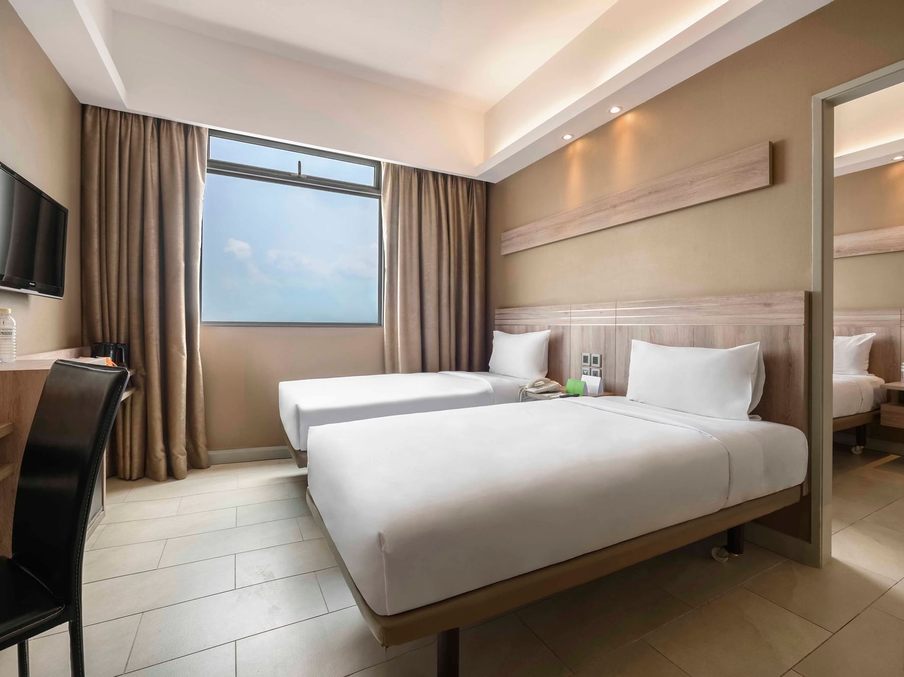 Double beds in the Family Room at Cititel Express Penang